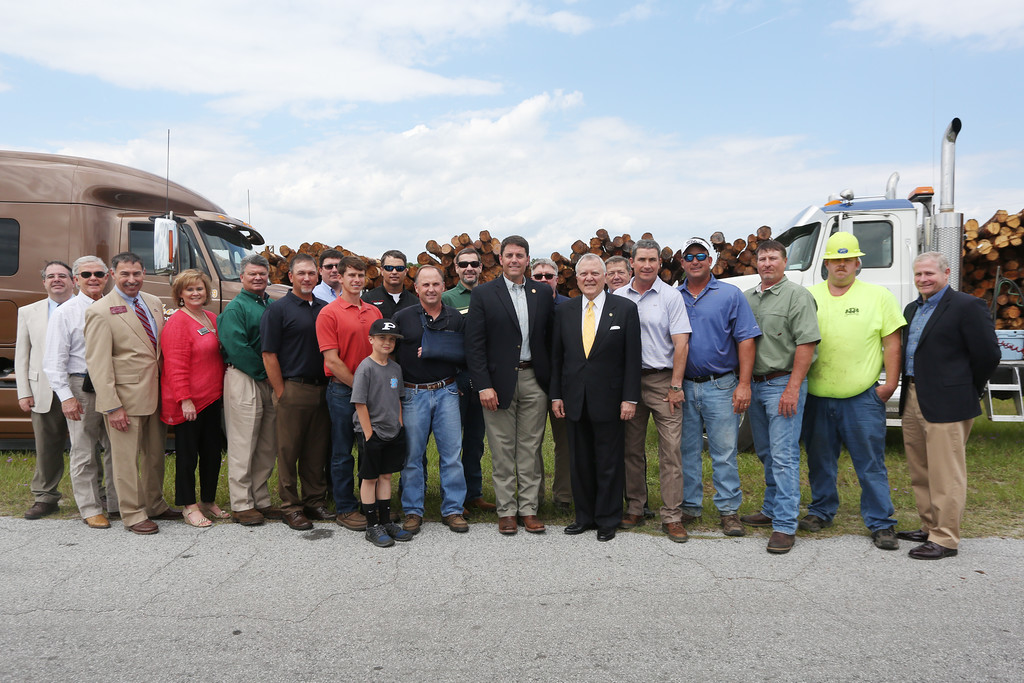 Governor Deal pictured with members of Georgia's forestry community at the signing ceremony for HB 255 at Gilman Building Products in Blackshear, Ga., on May 4, 2015. 